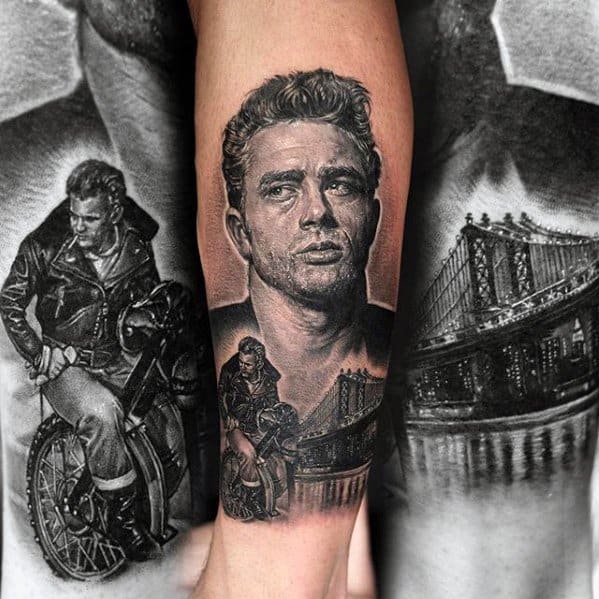 Highly detailed black and grey tattoo of James Dean, featuring him on a motorcycle and a city bridge backdrop for a cinematic urban vibe.
