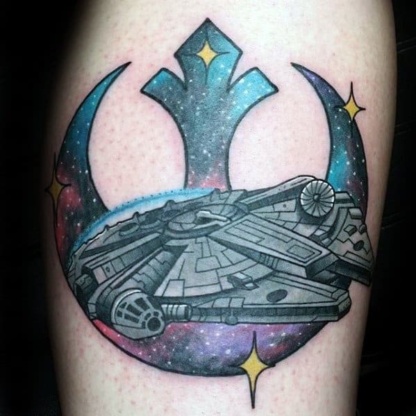 Rebel Alliance tattoo on upper arm featuring the Millennium Falcon with a colorful galaxy background