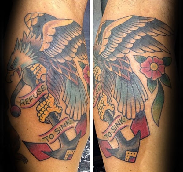 Colorful tattoo of an eagle, anchor, flower with a "Refuse To Sink" banner