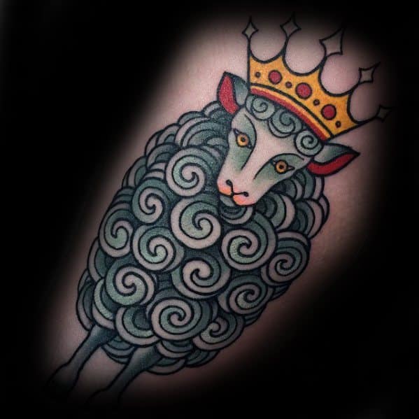Tattoo of a stylized sheep with curly wool, wearing a golden crown