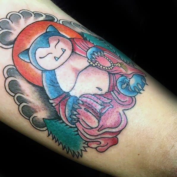 Snorlax tattoo styled as a peaceful Buddha, sitting in lotus pose with prayer beads, surrounded by clouds and a glowing halo.