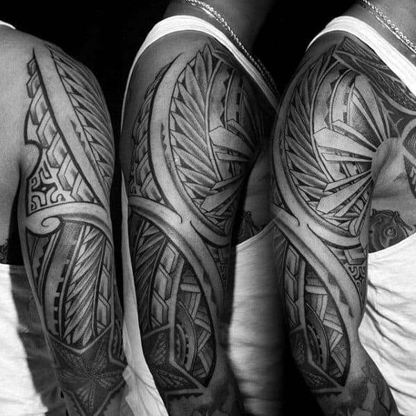 Unique Negative Space Sun Polynesian Male Tribal Arm Tattoo
