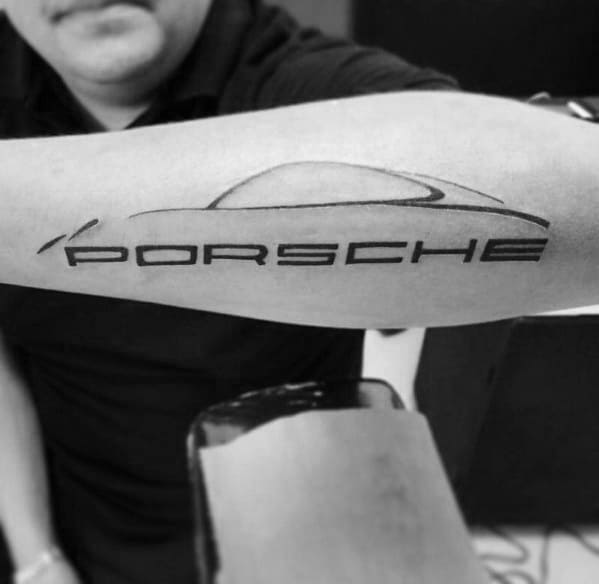 Minimalist Porsche silhouette tattoo with sleek black lines and bold brand lettering on the forearm.