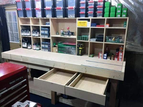 Well-constructed reloading bench with ample workspace, built-in open shelving for powders, ammunition, and tools, and two large pull-out drawers for hidden storage. The clean, organized layout makes this ideal for efficiency and functionality in a dedicated reloading space.