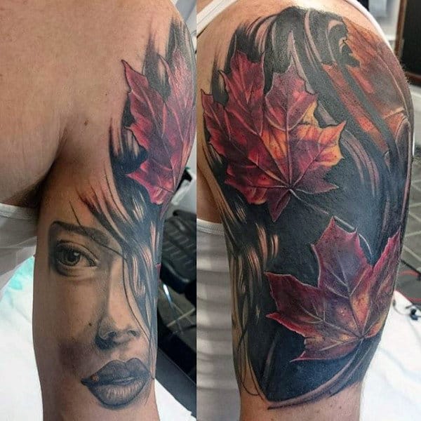Upper Arm Fall Leaf Mens Tattoos With Orange And Black Ink