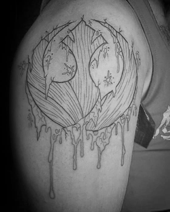 Rebel Alliance tattoo outline on the upper arm, featuring a dripping effect with starry patterns inside