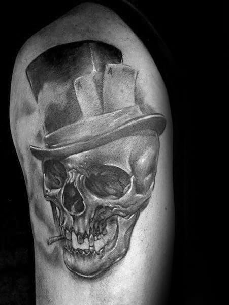 Upper Arm Heavily Shaded Skull Top Hat Mens Tattoo Designs