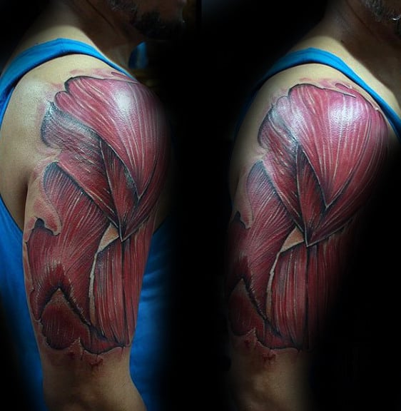 Upper Arm Layed Muscle Male Tattoo Ideas