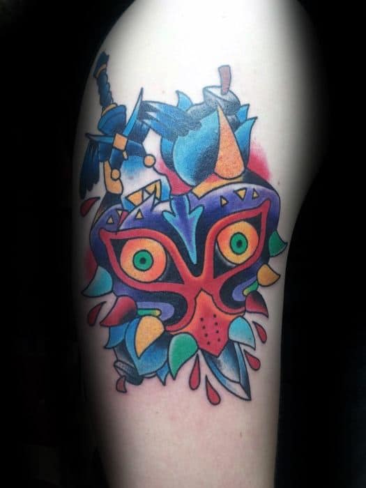 Upper Arm Majoras Mask Tattoo Design Ideas For Males