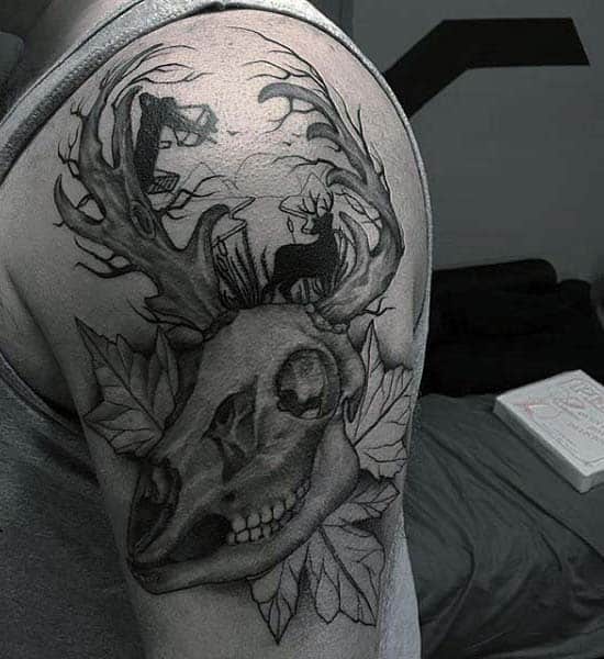 Upper Arm Male Tattoo Of Deer Skull And Archer Firing Arrow
