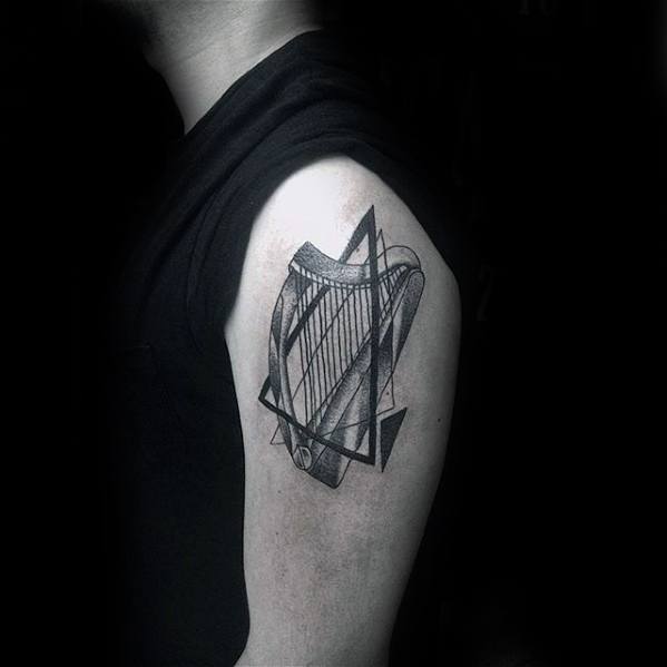 Upper Arm Male With Cool Harp Tattoo Design