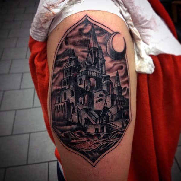 Upper Arm Moon And Castle Shield Tattoo For Males
