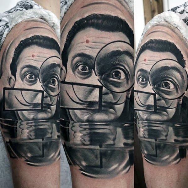 Black and grey Salvador Dali tattoo with magnifying glass distortions and mirrored water reflection, blending realism with surreal visual effects.