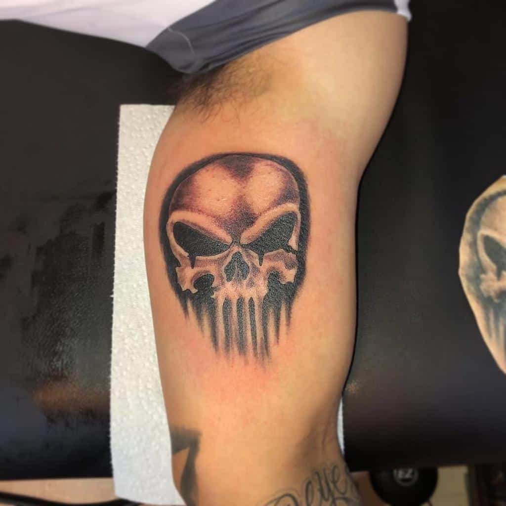 Bicep punisher skull tattoo