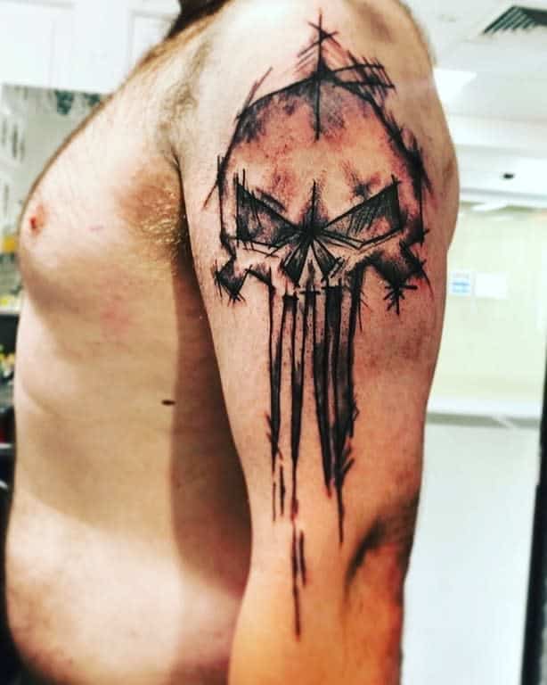 Abstract Punisher Skull tattoo on a an upper arm
