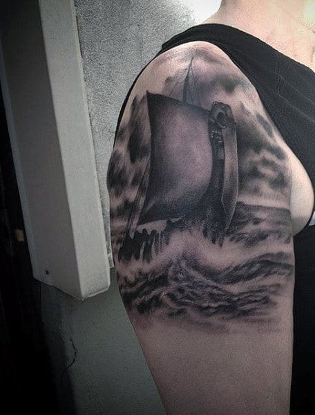 Upper Arm Ship Viking Style Tattoo On Men