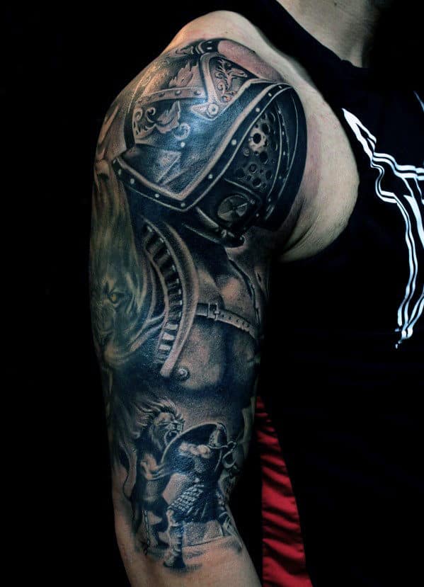 Arm tattoo featuring a detailed warrior in armor, lion, and other intricate designs