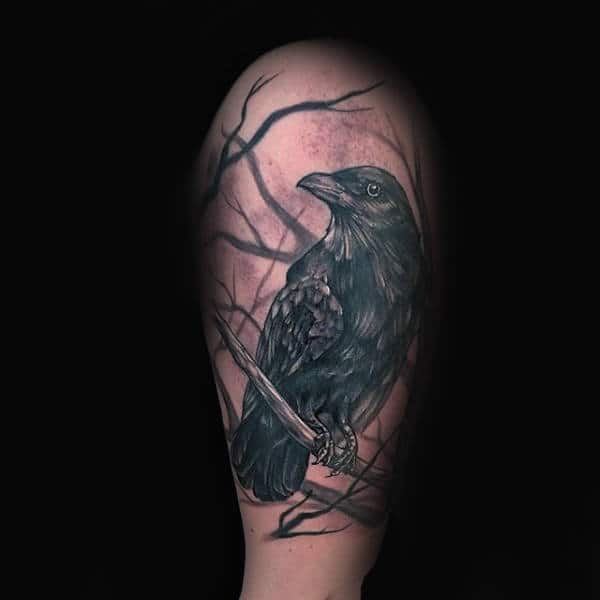 Upper Arm Tree Branches With Crow Tattoo On Male