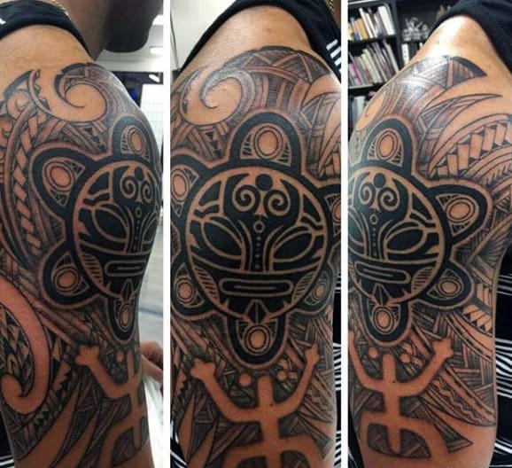 Upper Arm Tribal Male Taino Tattoo With Frog And Sun