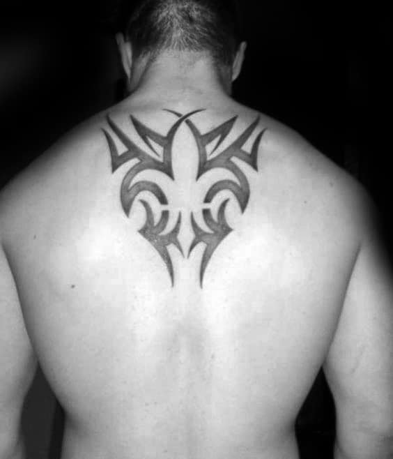 Upper Back Fleur De Lis Negative Space Tribal Tattoos For Guys
