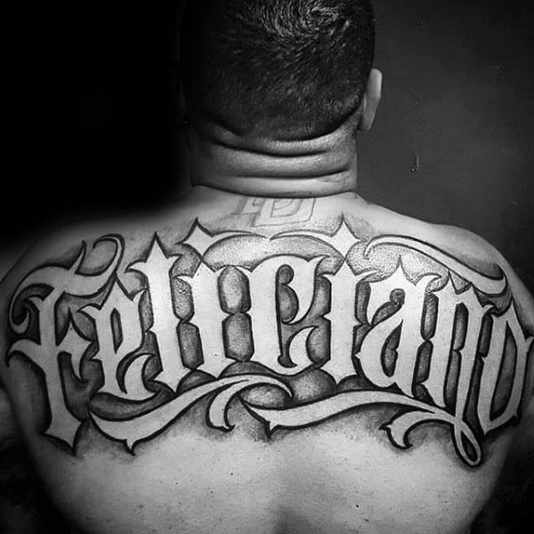 Upper Back Last Name Negative Space Manly Mens Tattoo Ideas