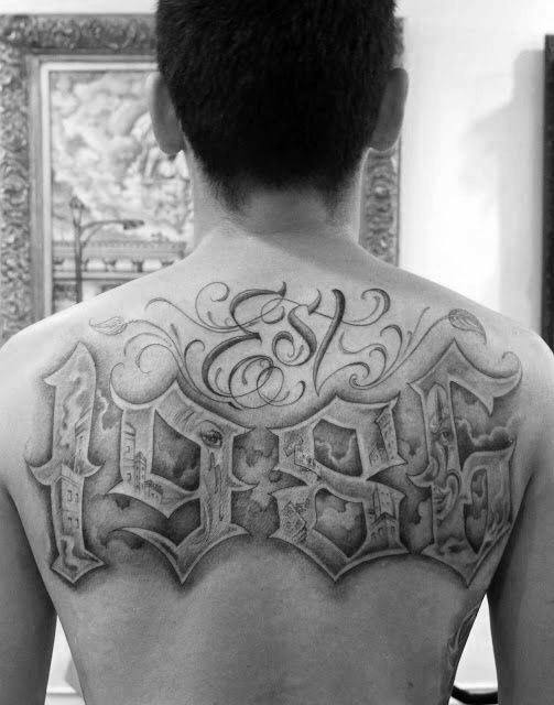 Upper Back Script Lettering Est 1986 Tattoo Designs For Men