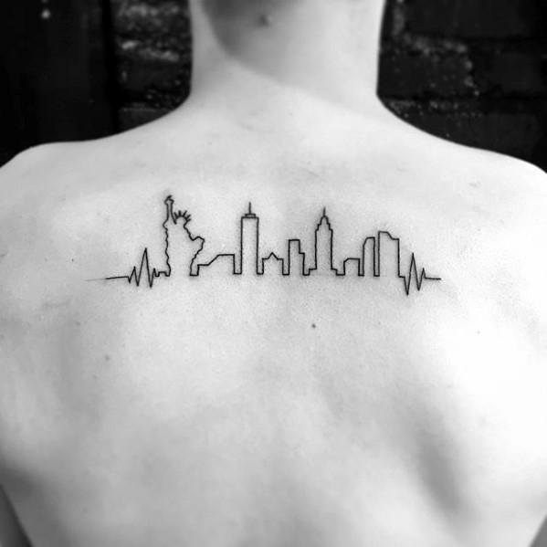 Minimalist back tattoo of the New York City skyline with the Statue of Liberty and heartbeat lines on both sides in clean black ink.