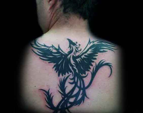 Upper Back Tribal Phoenix Tattoos For Men With Black Ink Designs