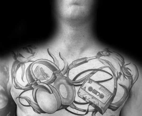 Upper Chest Artistic Male Headphones Tattoo Ideas