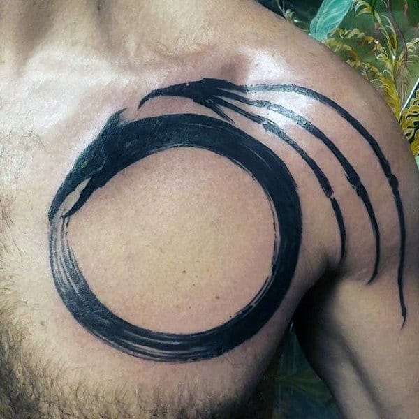 Upper Chest Circle Ouroboros Mens Tattoo Ideas