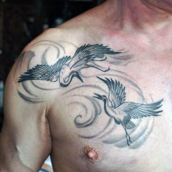 Upper Chest Flying Crane Birds With Wind Male Tattoos