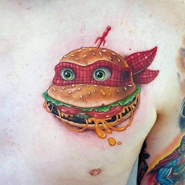 Cheeseburger tattoo design featuring a ninja theme, with eyes, red mask, lettuce, cheese, and dripping sauce