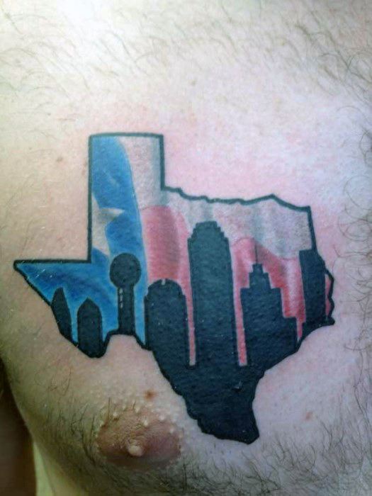 Bold chest tattoo of the Texas outline filled with a black Dallas skyline silhouette over a vibrant red, white, and blue flag background.
