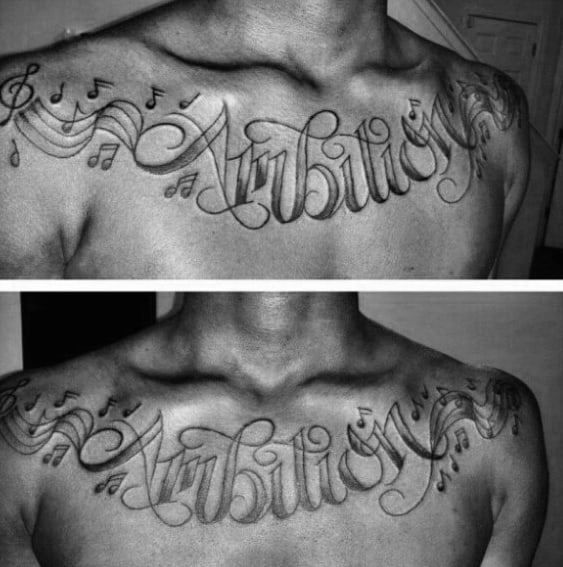 Close-up of a tattoo across a man's chest reading "Ambition" with musical notes dancing around it