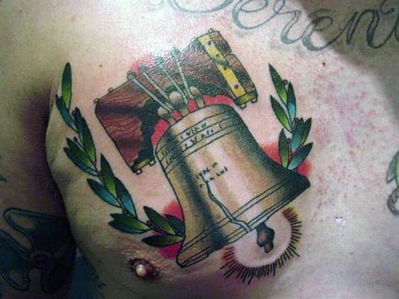 Upper Chest Ringing Liberty Bell Tattoo For Guys