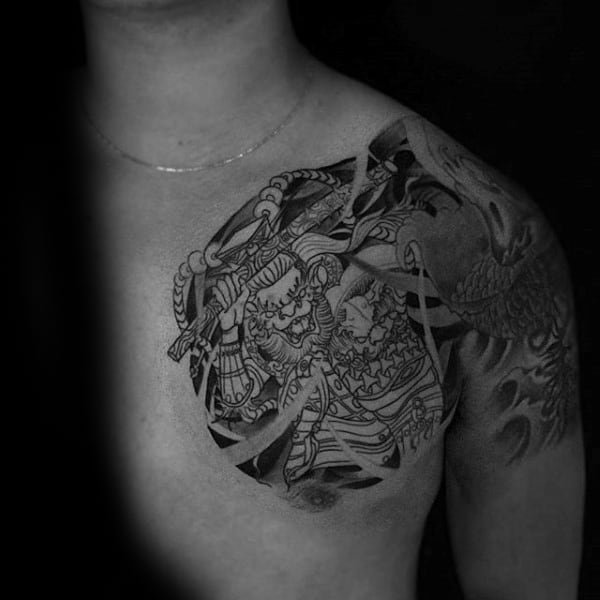 Upper Chest Tattoo Of Monkey King On Man