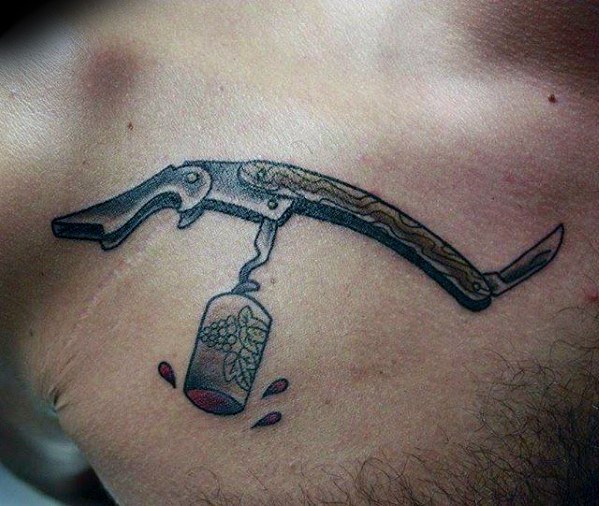 Upper Chest Wine Opener Mens Tattoo Ideas