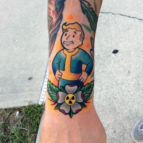 Vault Boy tattoo standing confidently above a flower with a radioactive symbol center, blending Fallout charm with vibrant floral detail.