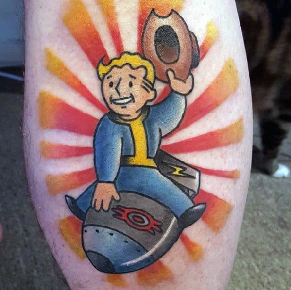 Vault Boy tattoo riding a bomb like a cowboy, waving his hat with bold red and yellow rays in the background for a dramatic Fallout vibe.