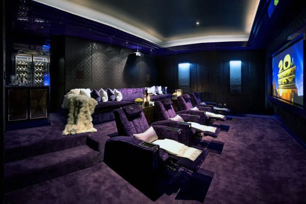 purple velvet basement movie room large screen 