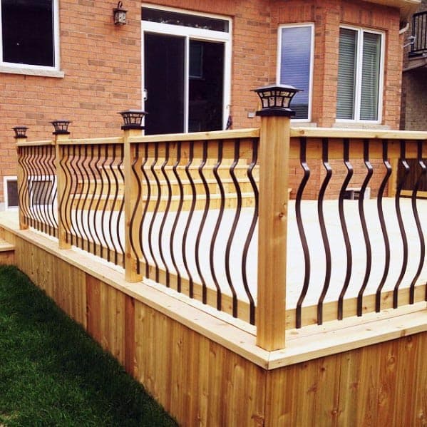 vertical wood board deck skirting wavy black balusters