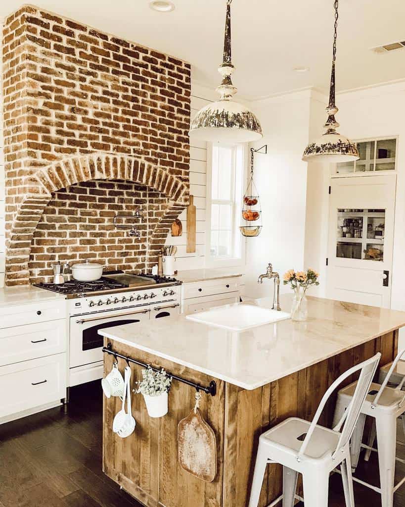 brick wall stove rustic farmhouse kitchen marble countertop 