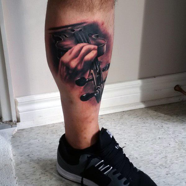 Hyper-realistic leg tattoo of a hand gripping a violin's scroll and tuning pegs, with detailed shading and depth for a lifelike 3D effect.