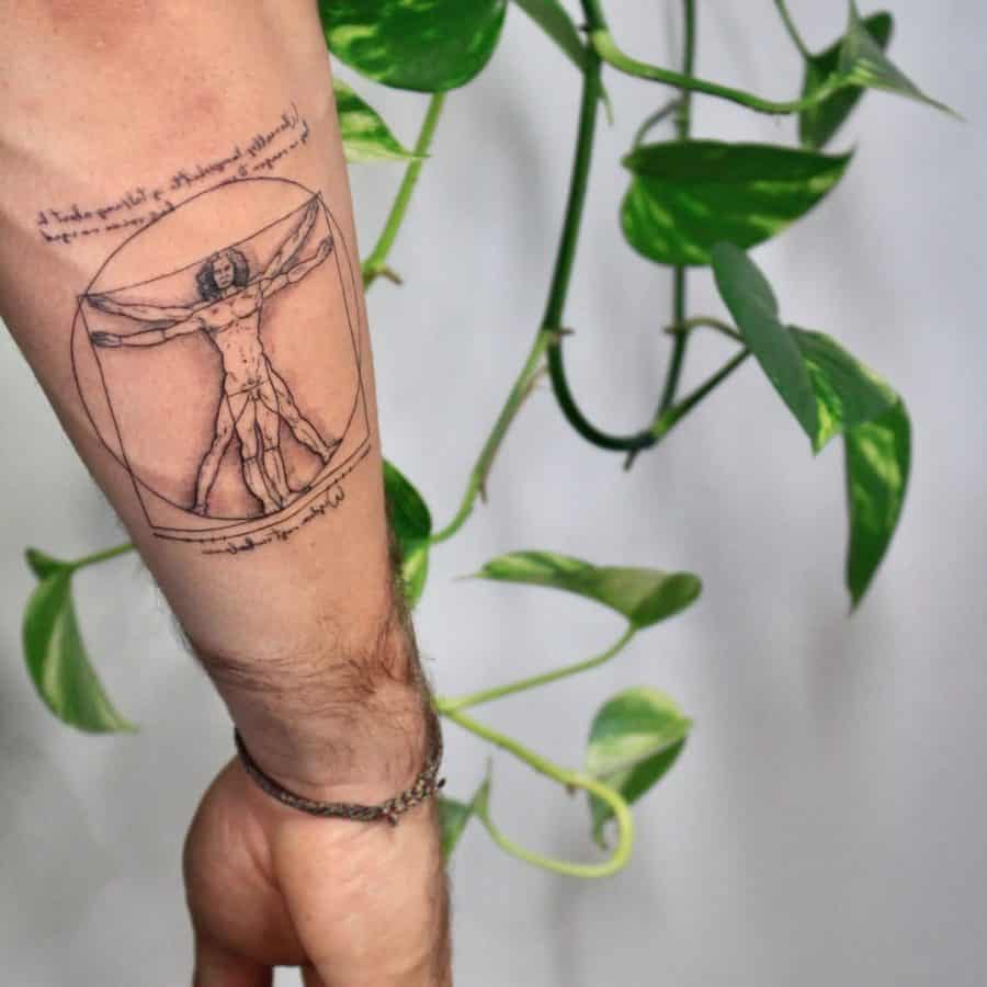 Forearm tattoo of Leonardo da Vinci’s Vitruvian Man, featuring fine linework and handwritten script for a classic, artistic look.