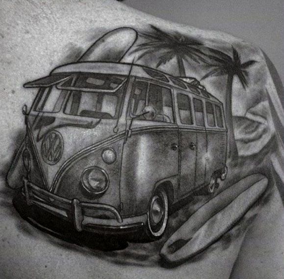 Black and gray tattoo of a Volkswagen van with surfboards and palm trees, capturing a vintage beach and surf lifestyle vibe on the shoulder.