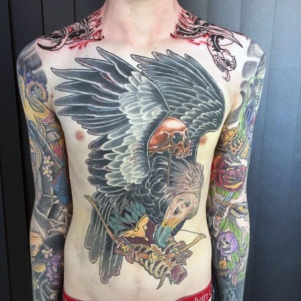Vulture Flying With Bones And Arrows Mens Chest Tattoo