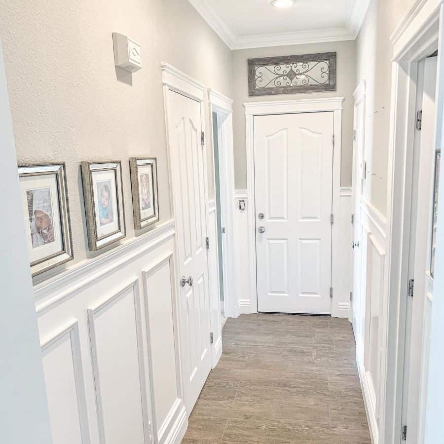 white wainscoting wall covering hallway