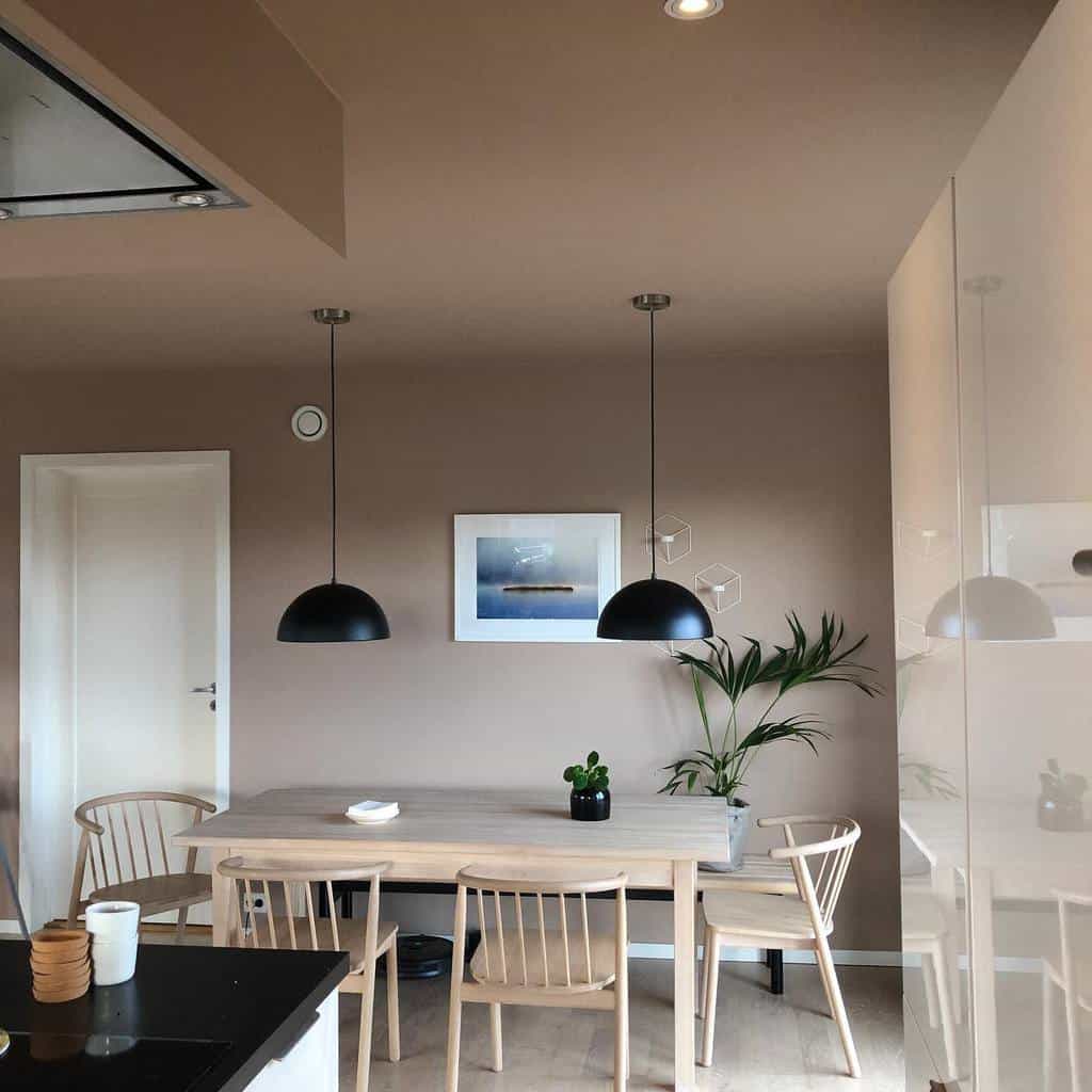 modern dining room wood table and chair hanging black ceiling lights