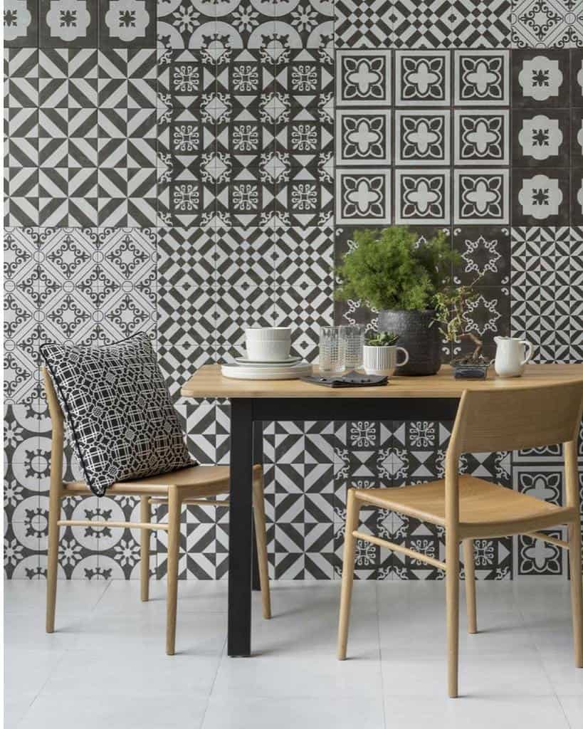 pattern design wallpaper small table and two chairs tile floor