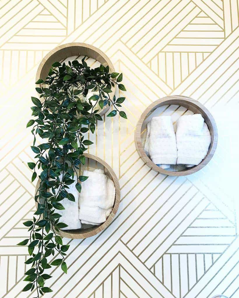 gold stripe wallpaper circular wall shelves bathroom